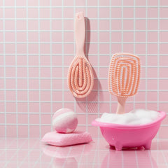 Crave Naturals FLEX DMC detangling brush side profile showing rounded contact surface.