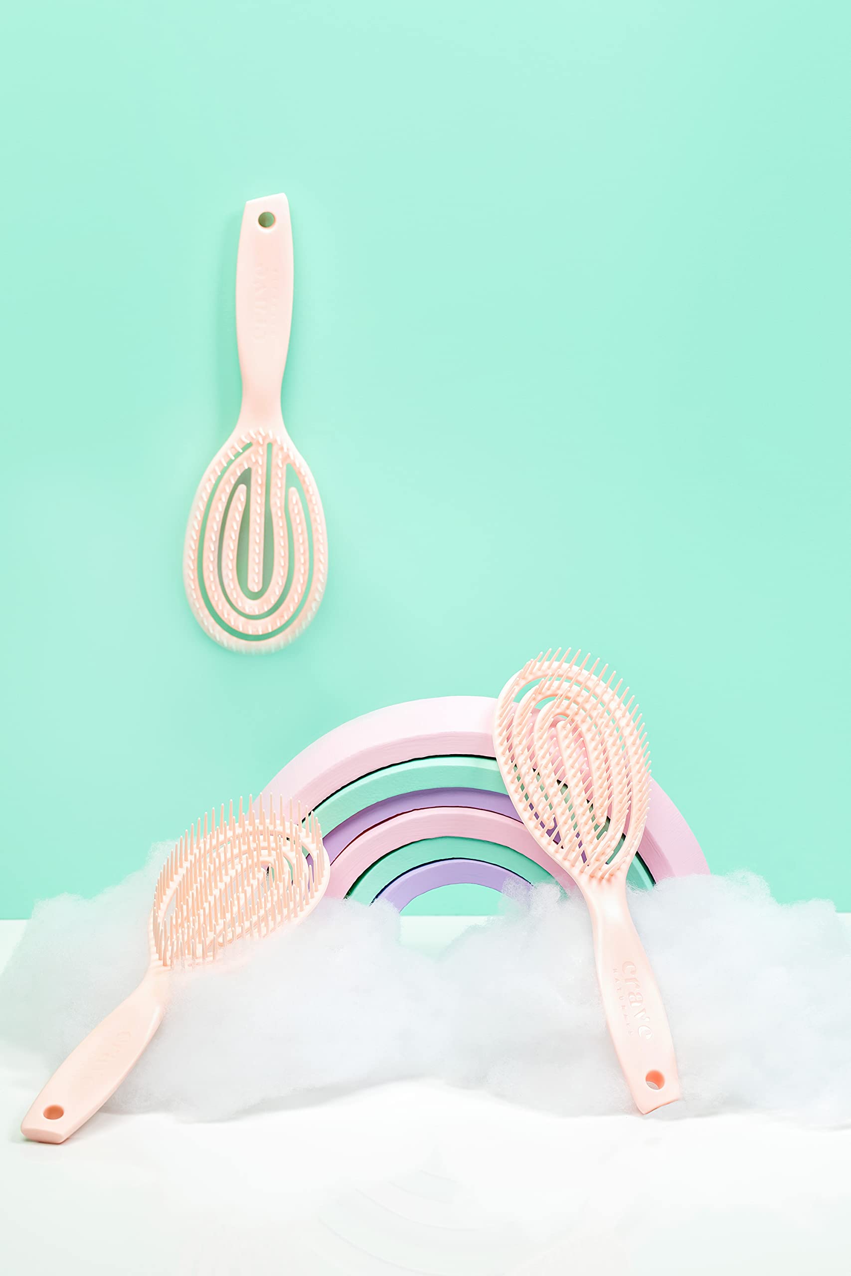 Crave Naturals FLEX DMC detangling brush in wet-use context for damp hair detangling.