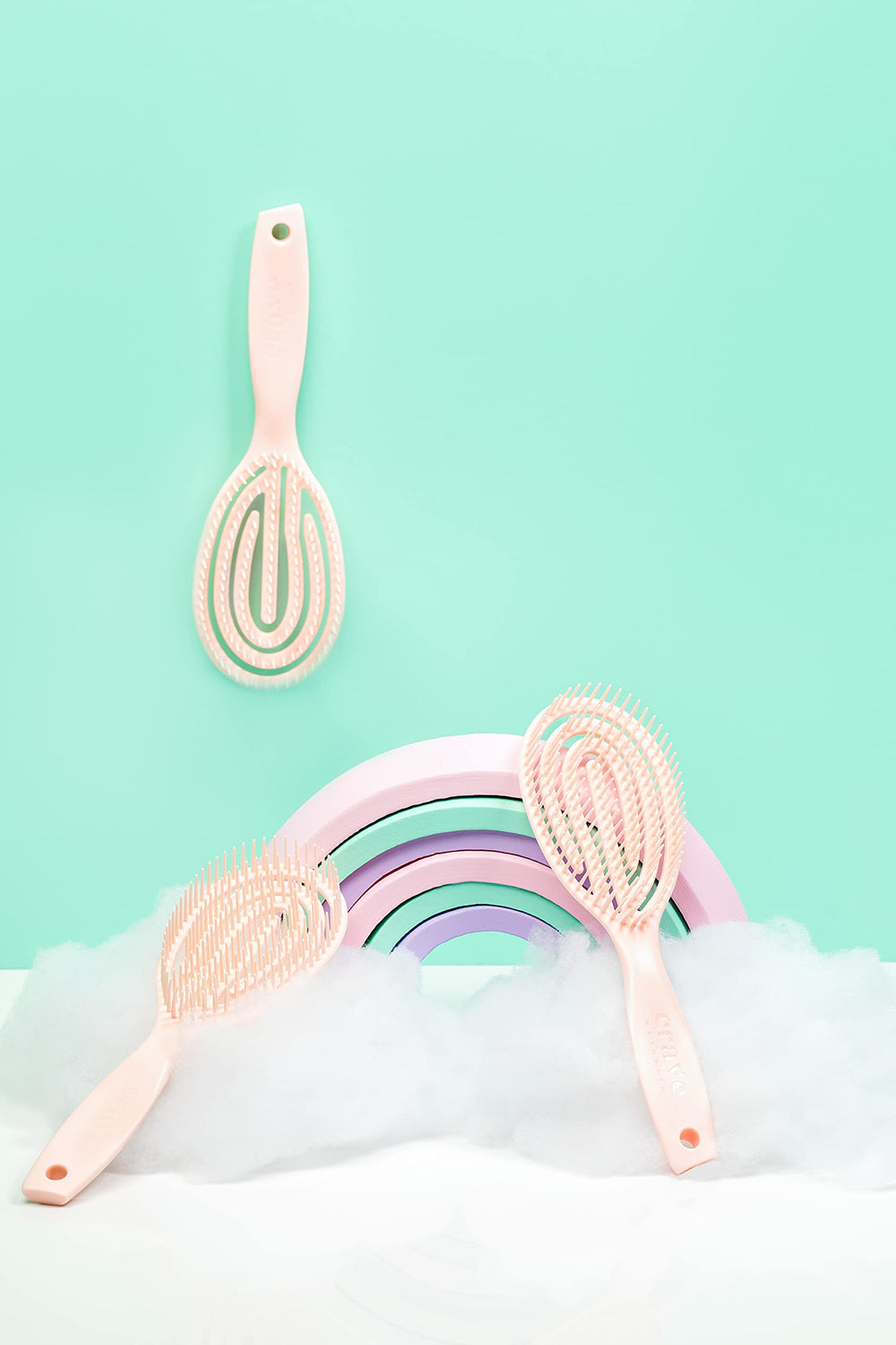 Crave Naturals FLEX DMC detangling brush in wet-use context for damp hair detangling.