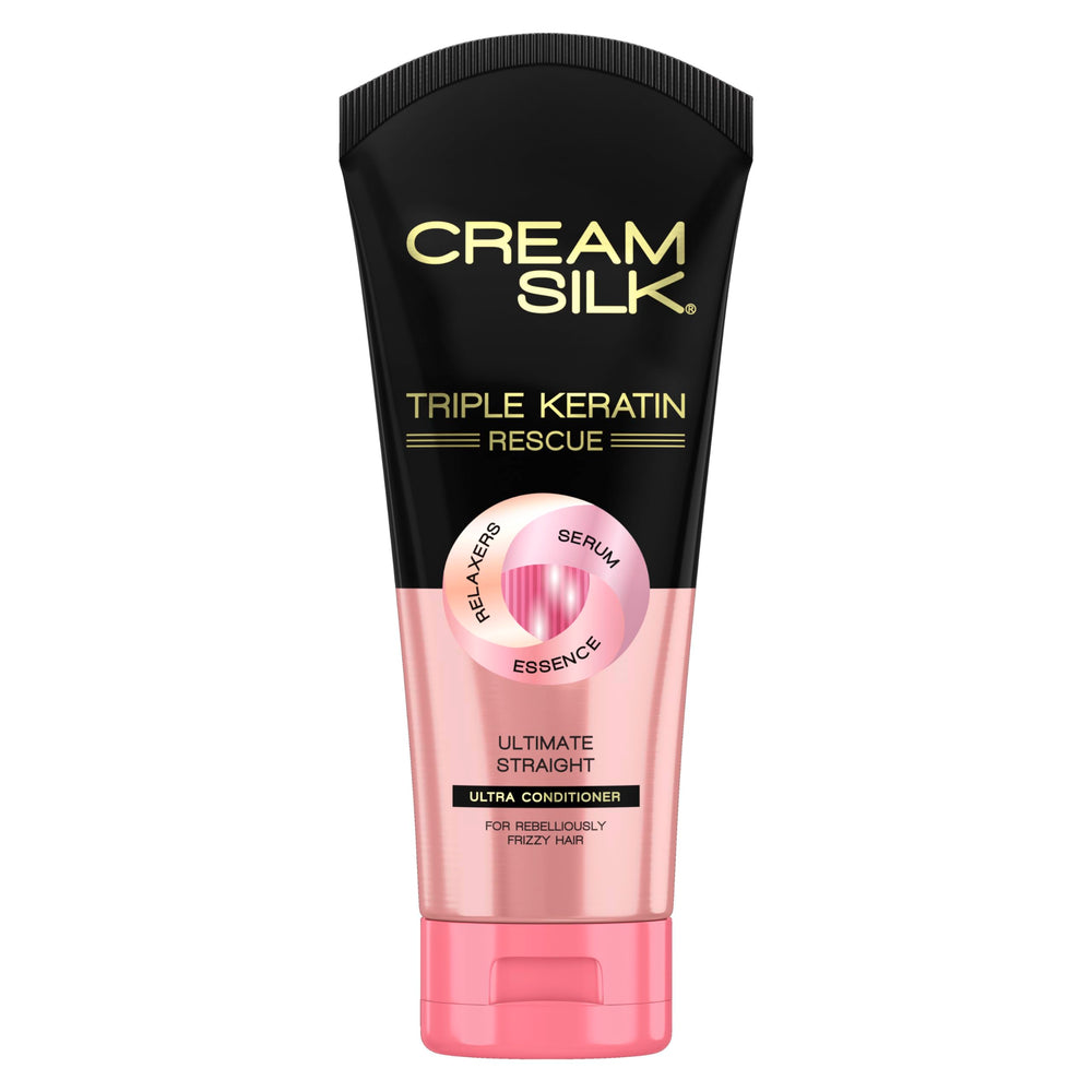 Cream Silk Triple Keratin Rescue bottle delivers anti-frizz hydration for smooth hair.