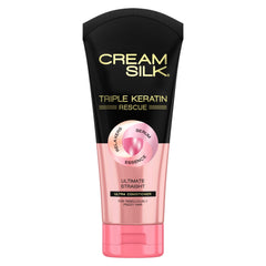 Cream Silk Triple Keratin Rescue bottle delivers anti-frizz hydration for smooth hair.