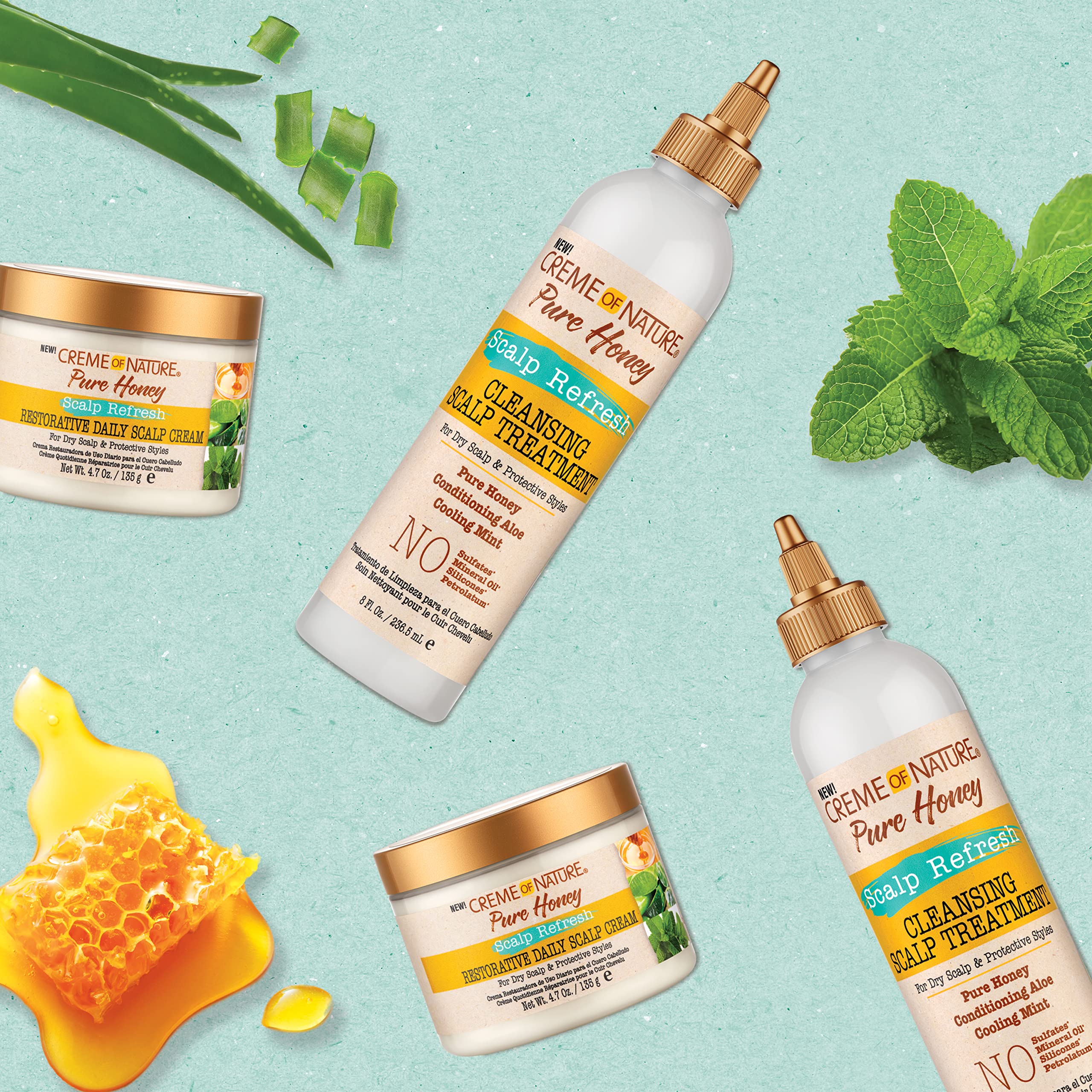 Dry towel removal of buildup shown with Creme of Nature Pure Honey.