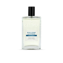 Cremo Blue Cedar & Cypress bottle-front view showing woodsy fragrance for daily wear