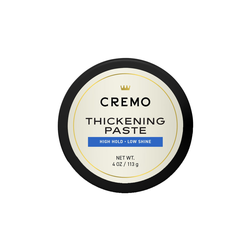 Cremo hair thickening paste packshot highlighting barber-grade styling