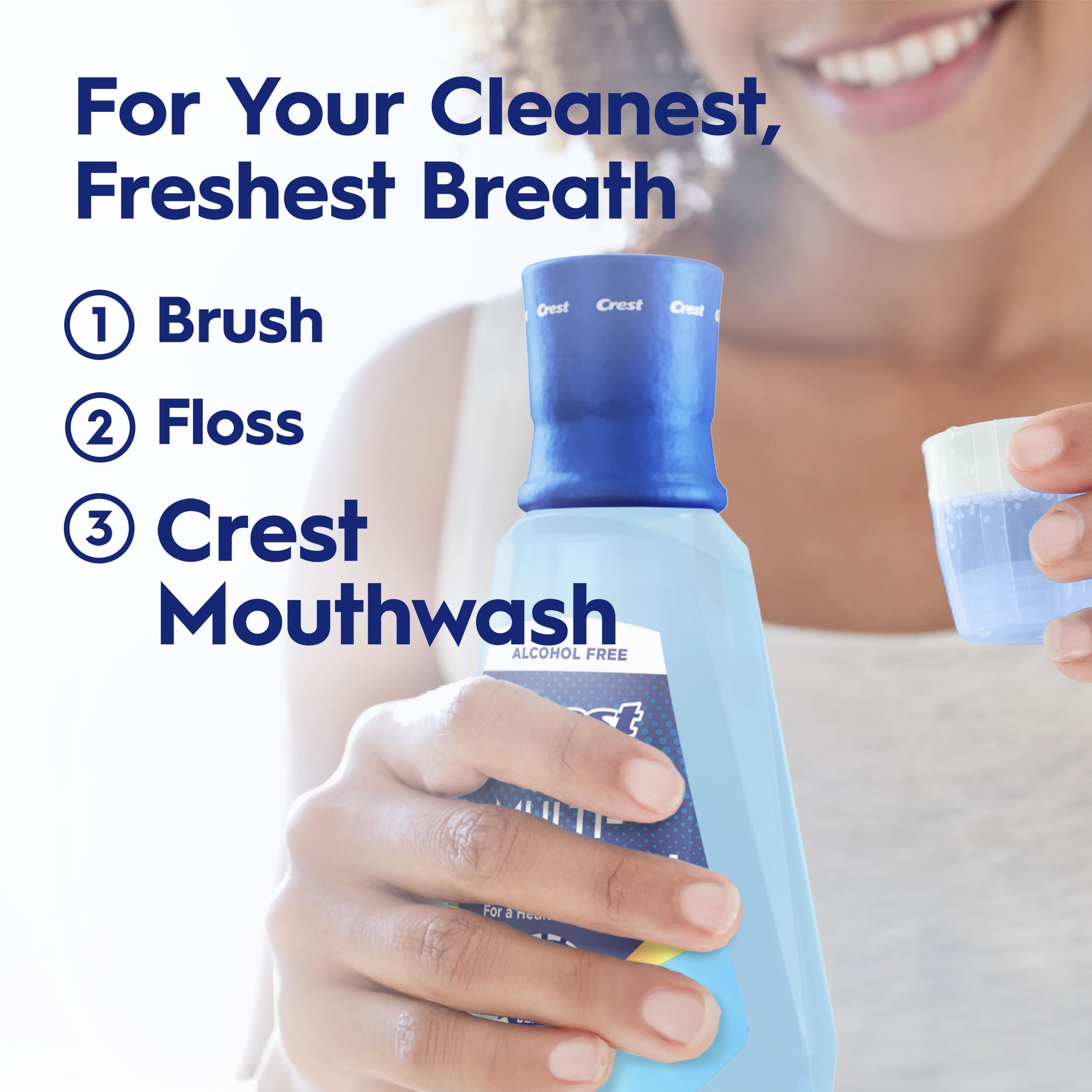 Crest bottle beside toothbrush demonstrating routine complement