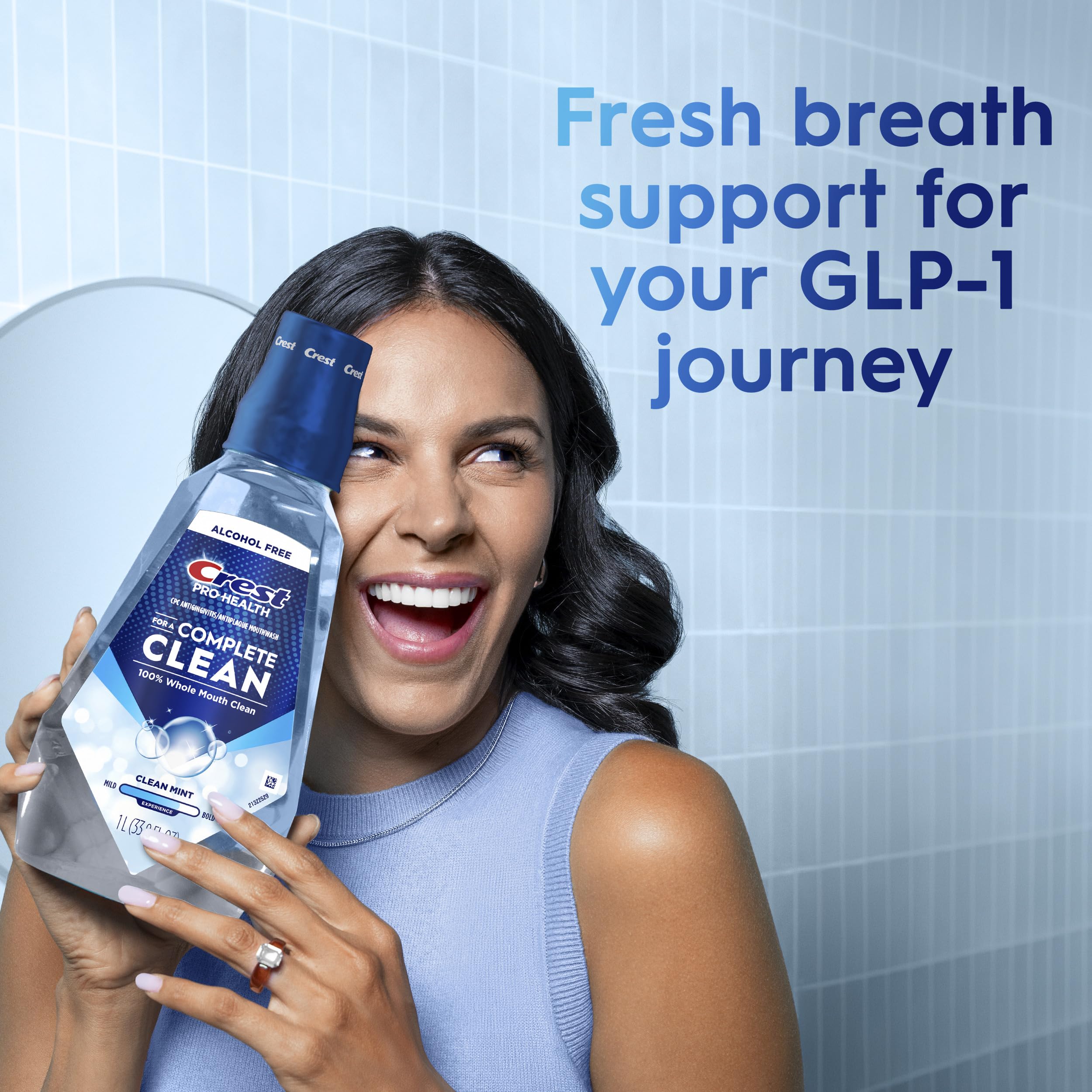 Person using Crest Pro-Health in morning routine for lasting freshness
