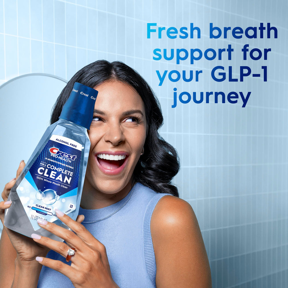Person using Crest Pro-Health in morning routine for lasting freshness
