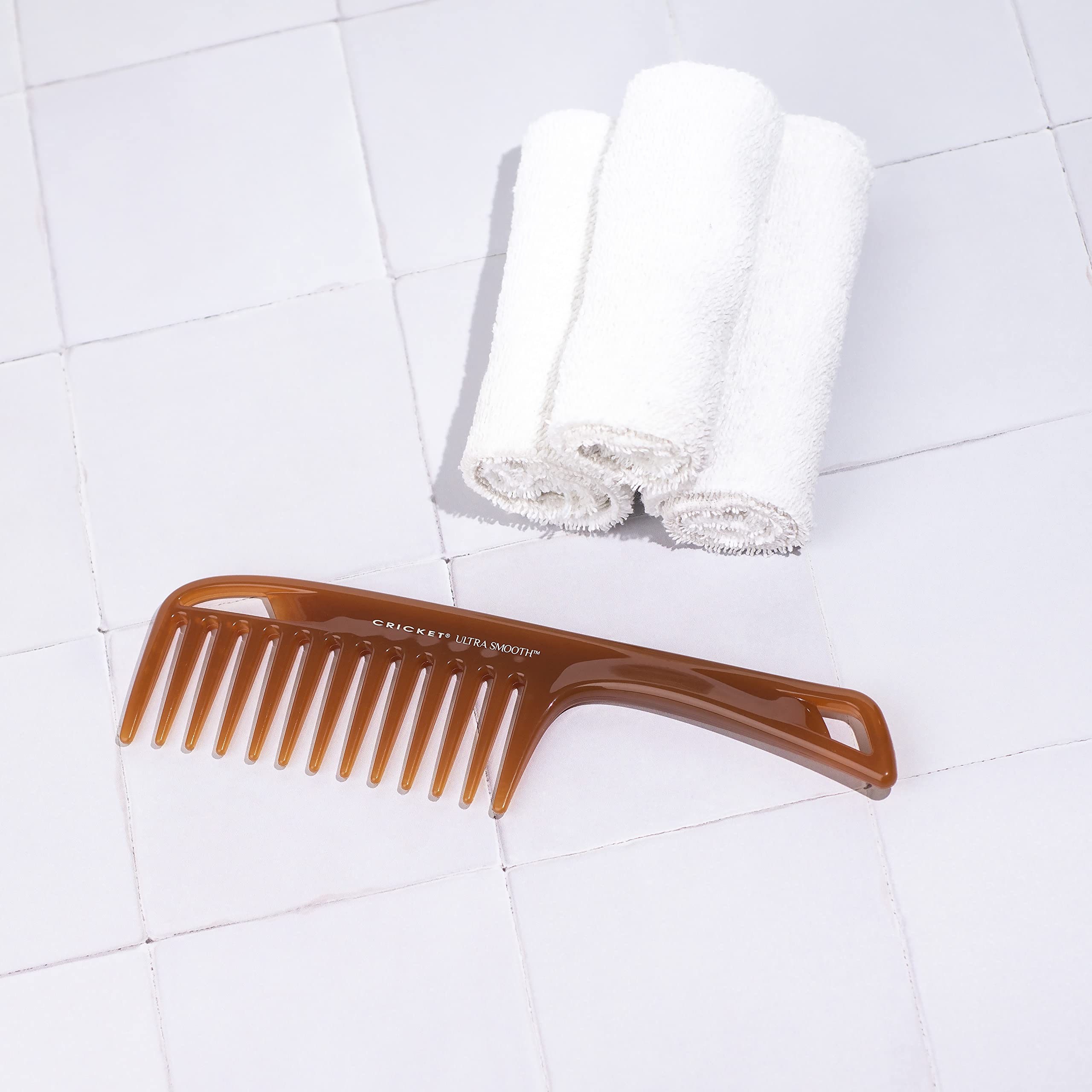 Cricket Ultra Smooth Detangler Comb with argan olive oil infusion for hydration.