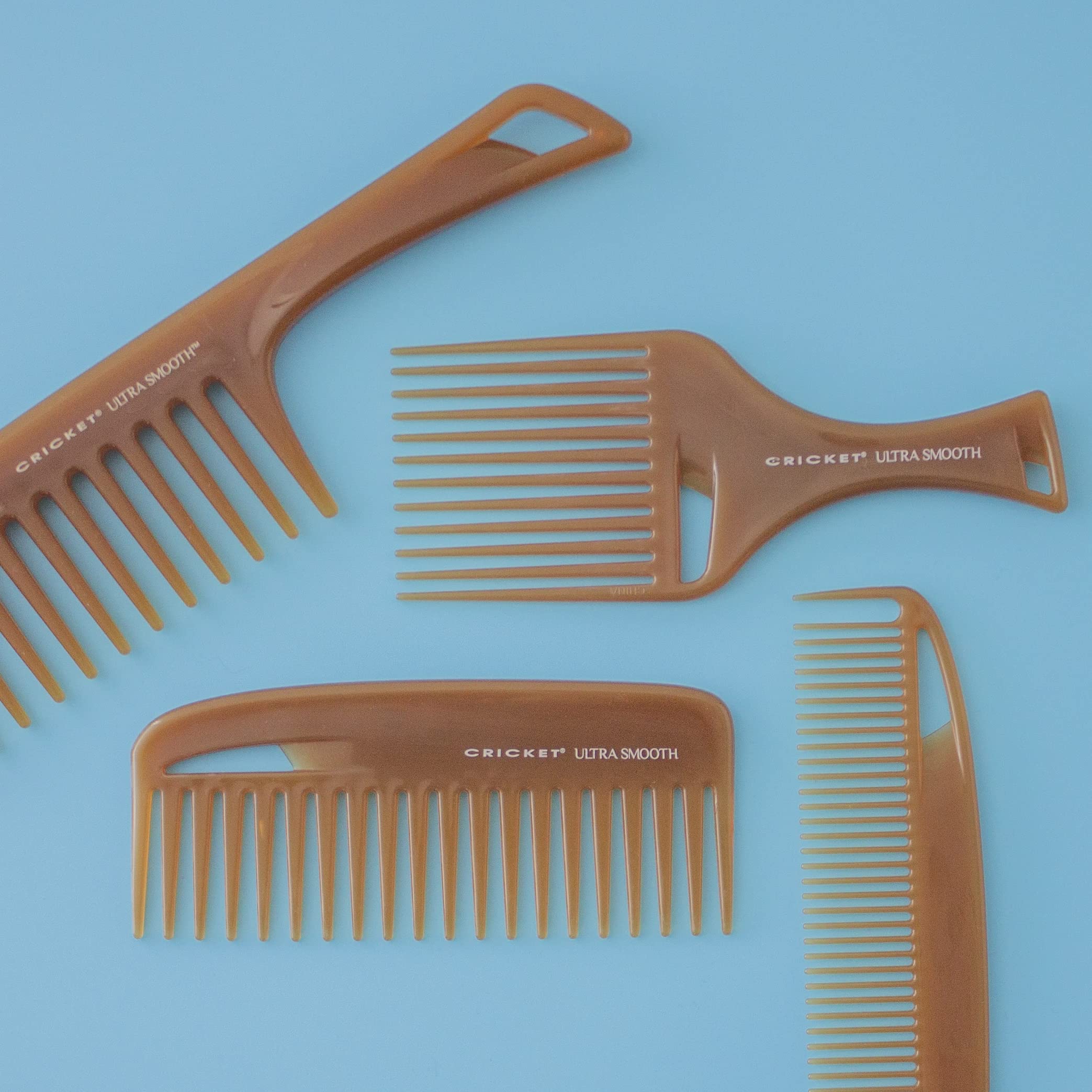 Cricket Ultra Smooth Hair Pick in-hand demonstrates comfortable grip and control