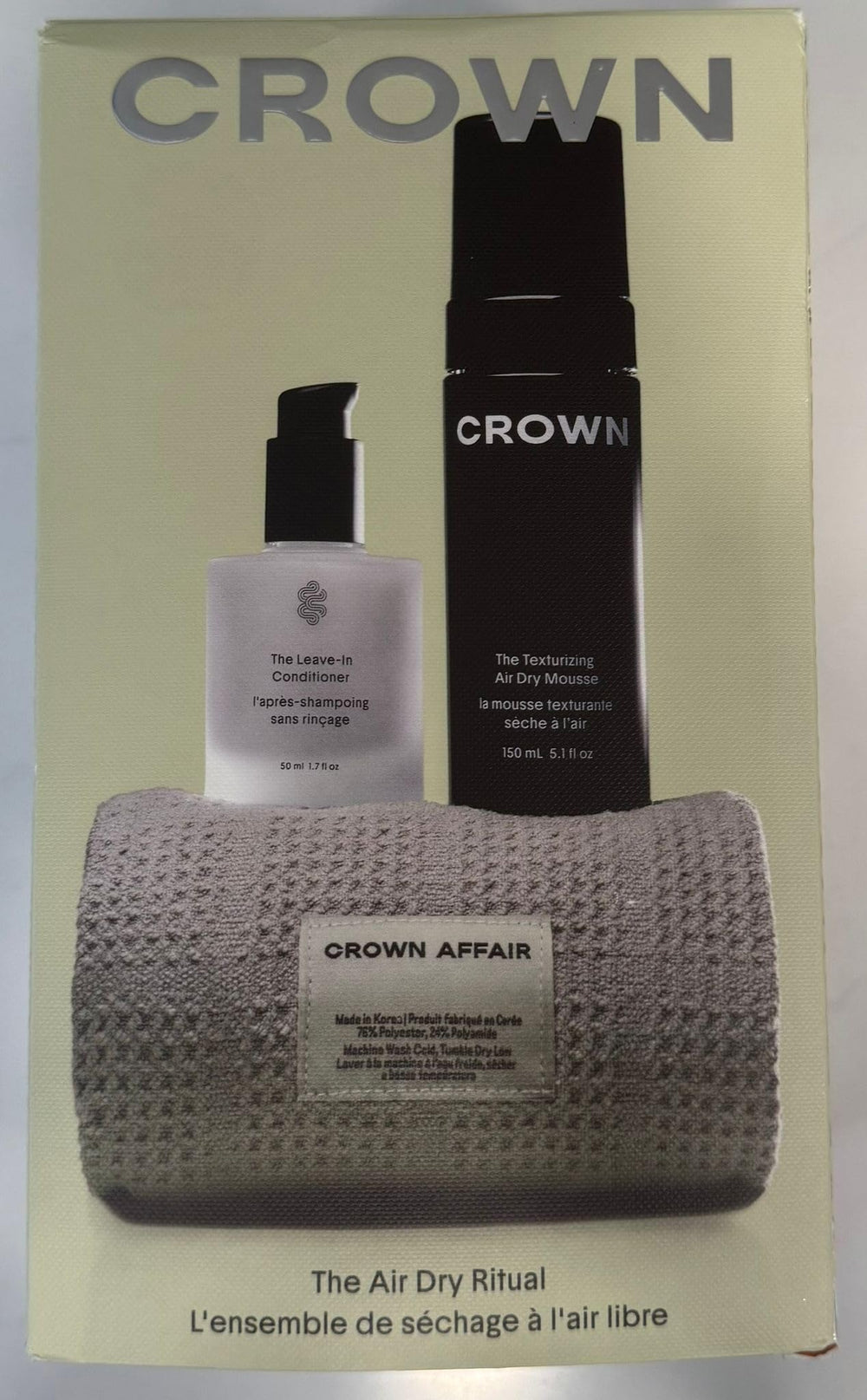 Crown Affair Air Dry Ritual mousse bottle creates natural texture with light hold without crunch.