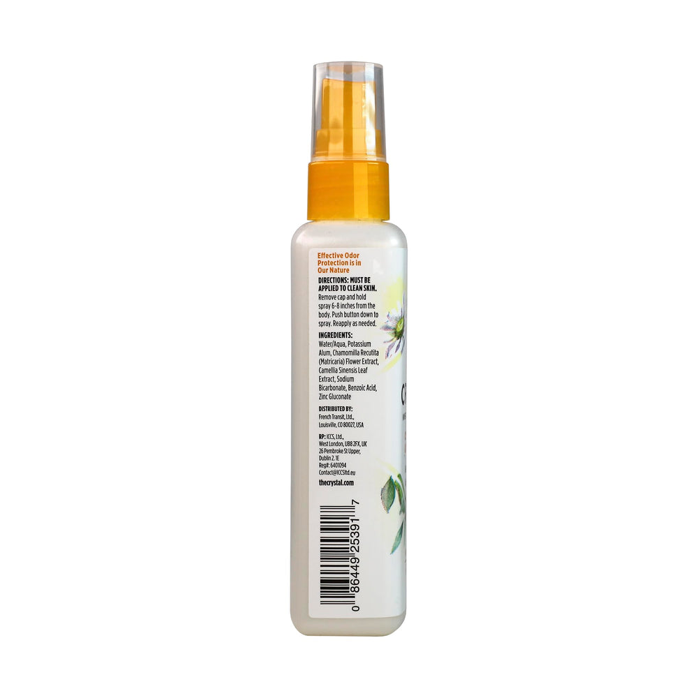 Crystal Essence application near armpit using spray for all-day freshness