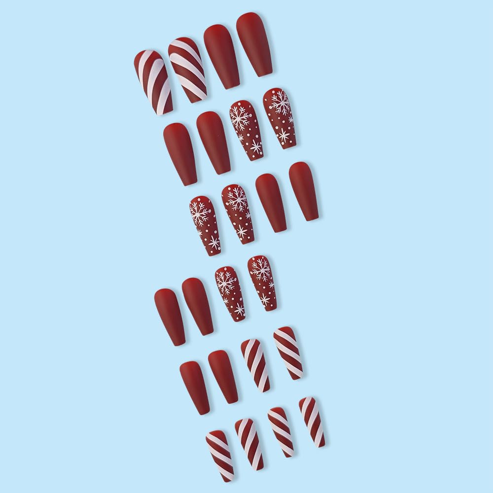 CTTHNBD coffin-shaped nails demonstrate dramatic yet wearable holiday nail art.