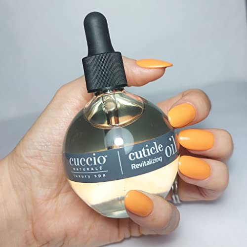 Cuccio Naturale Cuticle Oil application shows quick absorption for soft, resilient cuticles.