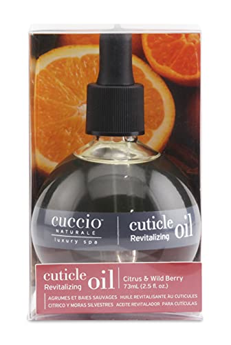 Cuccio Naturale Cuticle Oil Citrus Wild Berry in spa like setting for at home care.