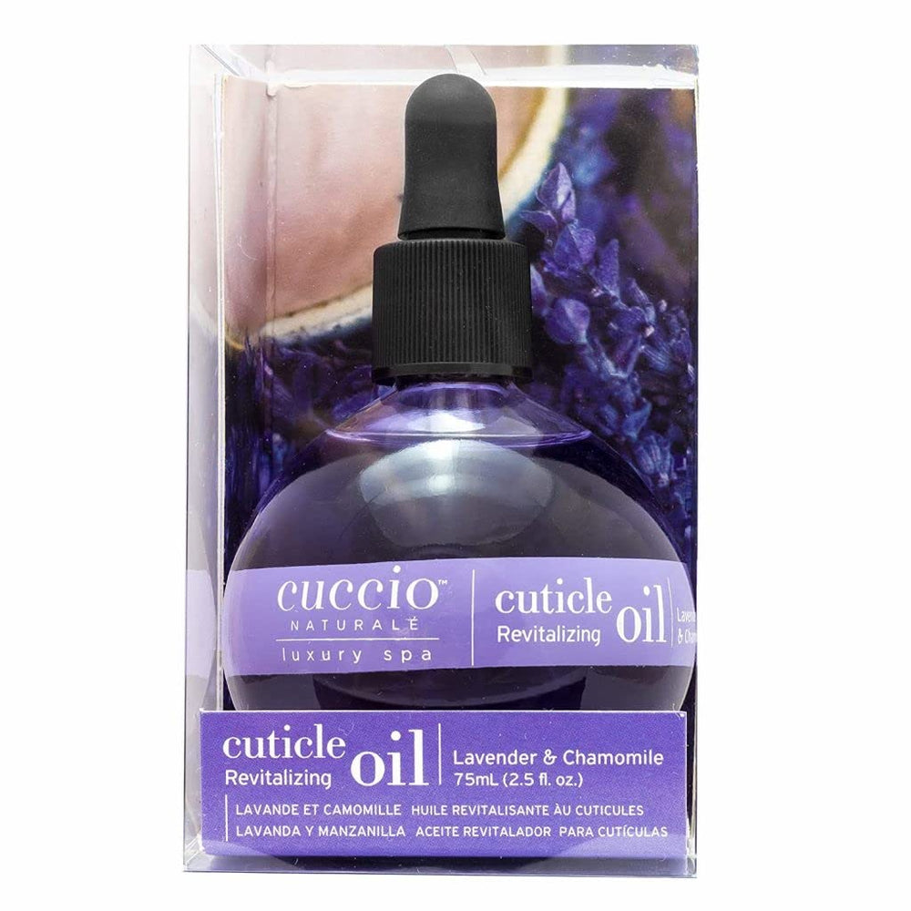 Cuccio Naturale Cuticle Revitalizing Oil dropper applying moisturizer for nails and cuticles