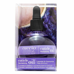 Cuccio Naturale Cuticle Revitalizing Oil dropper applying moisturizer for nails and cuticles