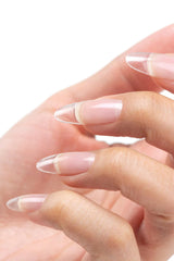 Cuccio Pro Builder Gel with self-leveling consistency delivering a smooth, even application.