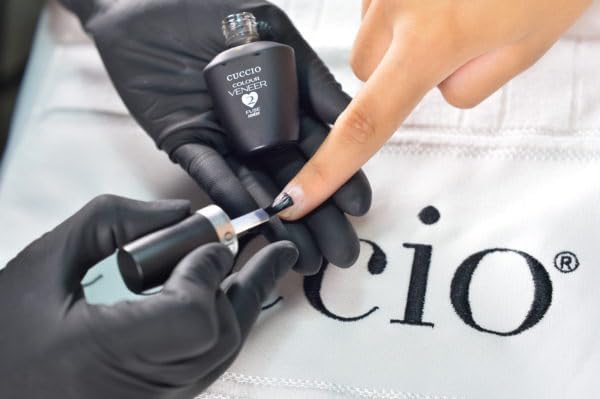 Cuccio Veneer Base bottle provides a smooth foundation for even color.