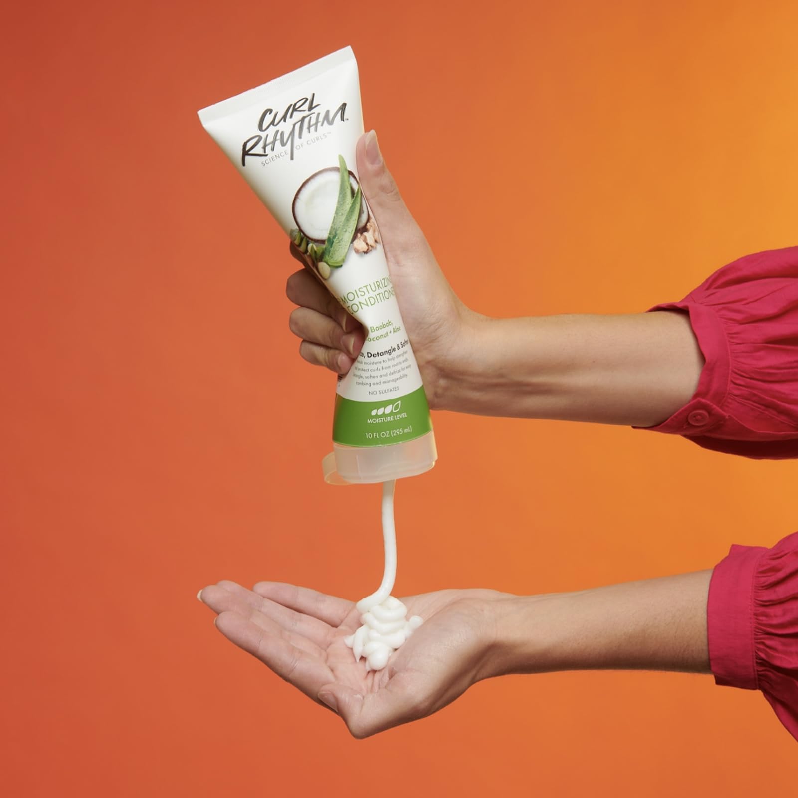 Curl Rhythm Deep Moisturizing Curl Conditioner bottle with coconut and aloe nourishes