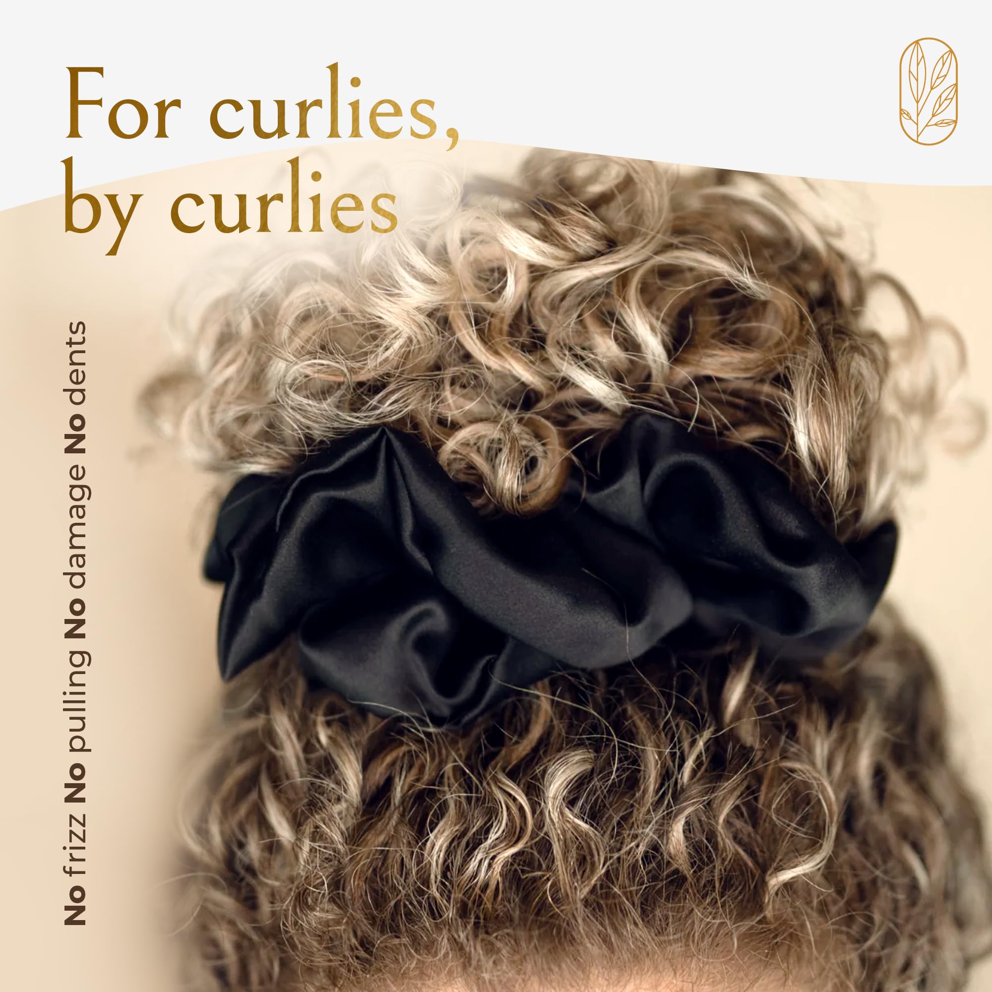 Curlfriend Collective sleep-friendly silk scrunchie preserves waves overnight.