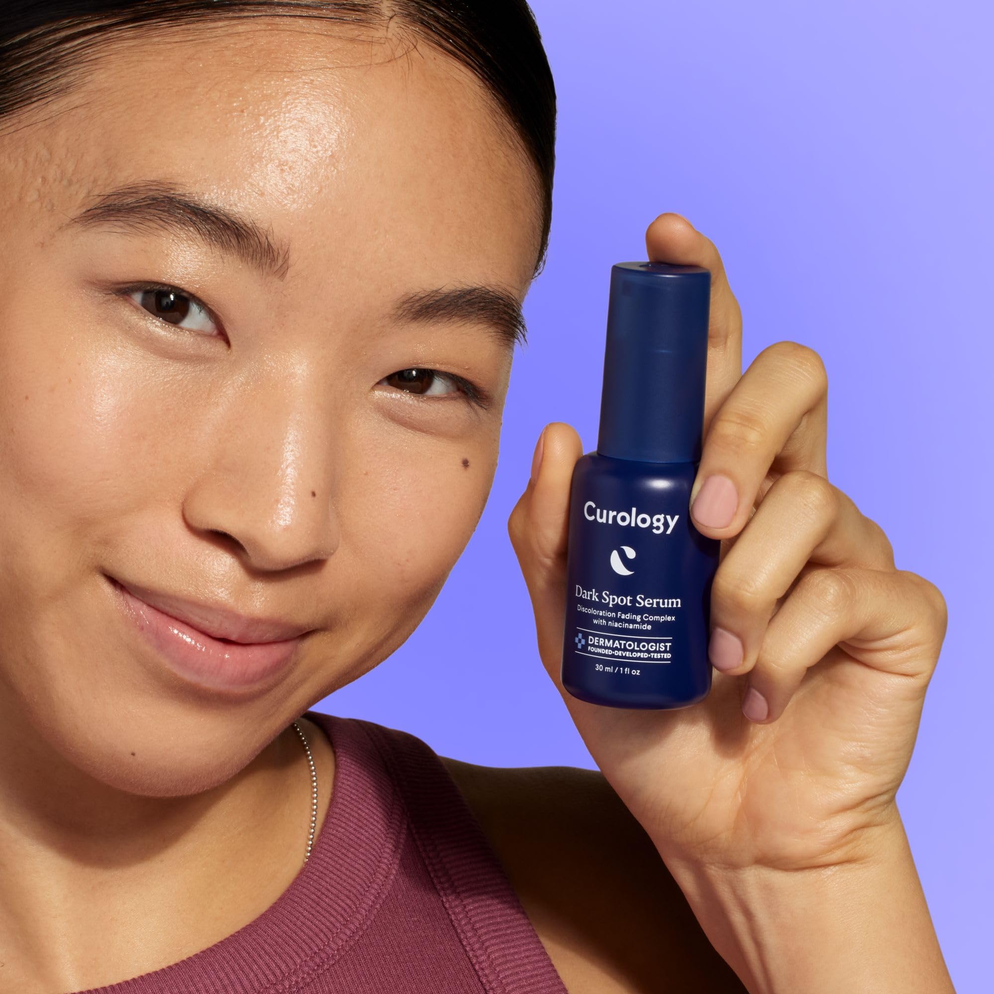 Close-up of Curology Dark Spot Serum application, highlighting quick absorption without grease.