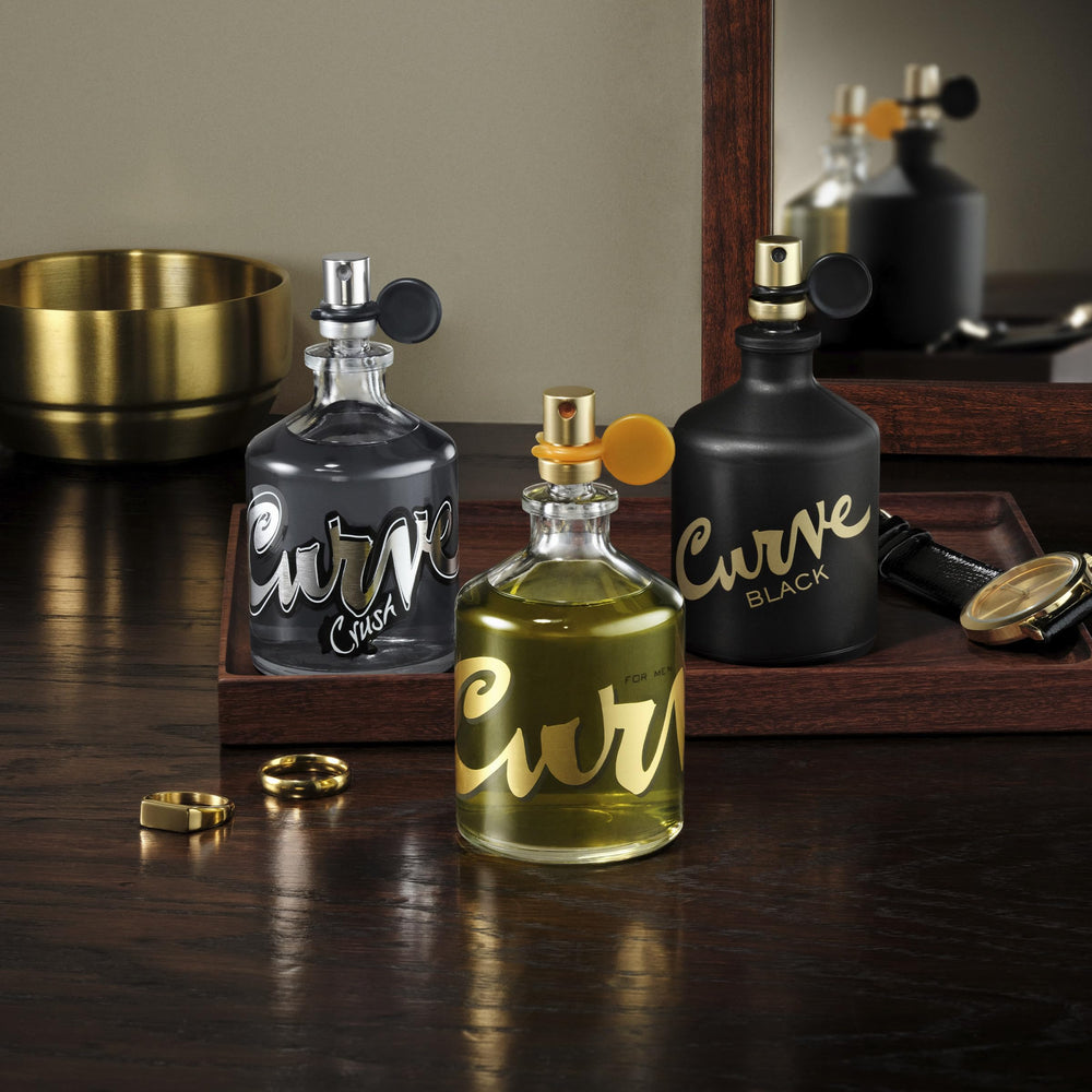 Curve Black for Men bottle side view hints at balanced citrus and woody notes.