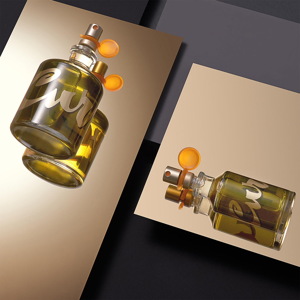 Curve men's cologne bottle closeup with reflective glass finish.