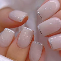 Curvlife press-on nails in ivory silvery white with a natural gel finish for daily wear.