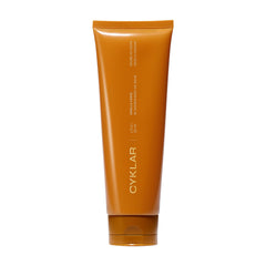 CYKLAR In-Shower Oil Balm bottle highlights hydrating formula for silky skin.