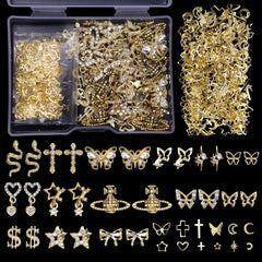 Cynailli 320pcs 3D nail charms collection closeup shows diverse gold designs for vibrant nail art.