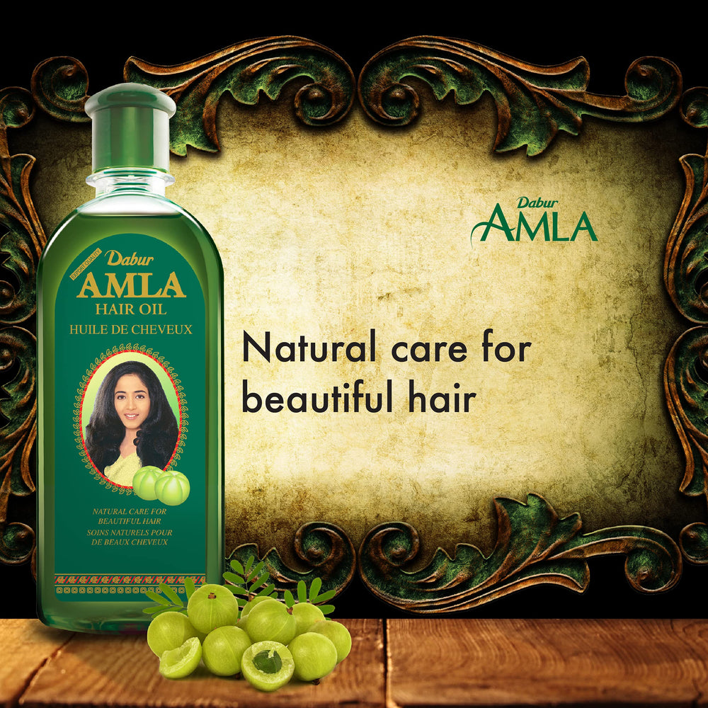 Dabur Amla Hair Oil scalp-massage demonstrates root nourishment focus.