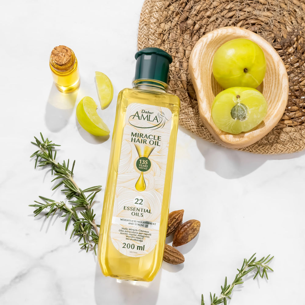 Dabur Amla Luxe 22-oil blend image suggests deep root-to-tip nourishment