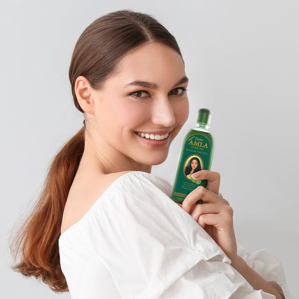 Dabur Amla Hair Oil glow on hair after use adds shine.