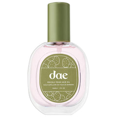 DAE Prickly Pear Hair Oil bottle pour demonstrates smooth finish with quick hydration for dry hair.