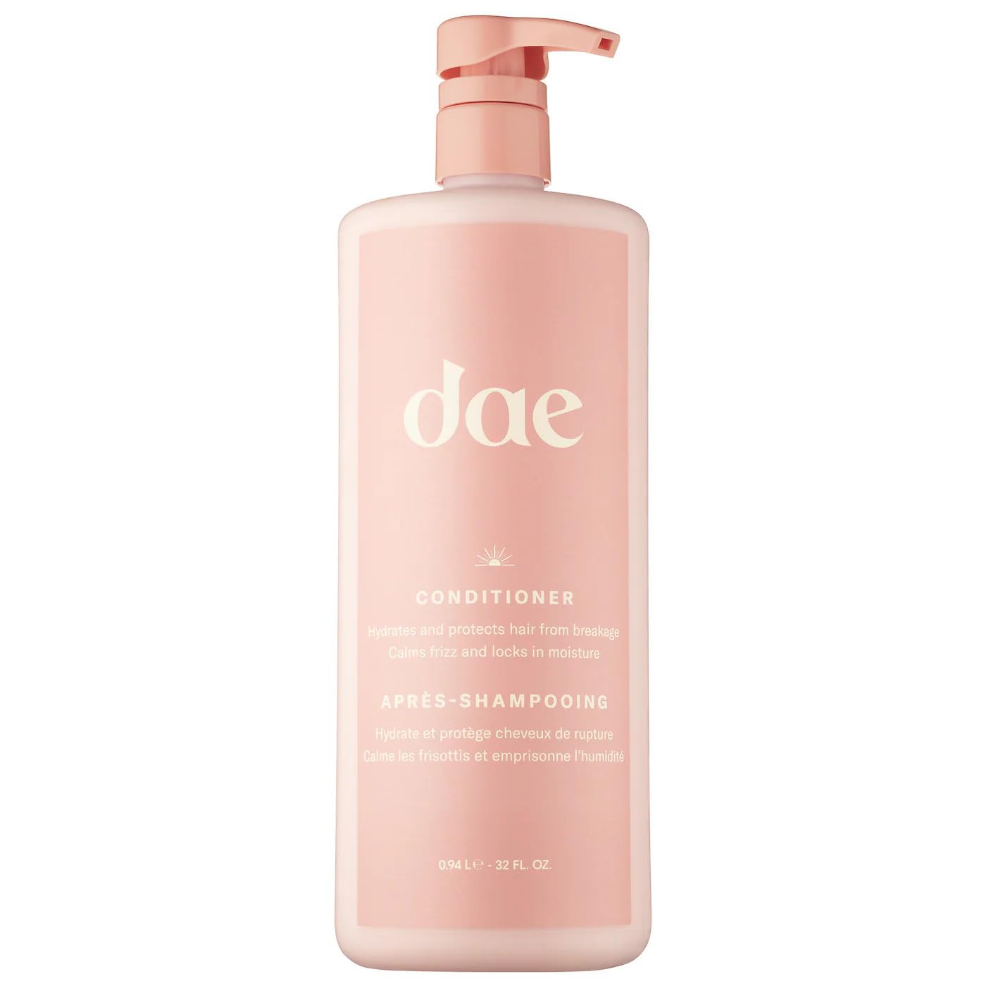 DAE Signature Conditioner bottle pouring for smooth hydration and frizz control.