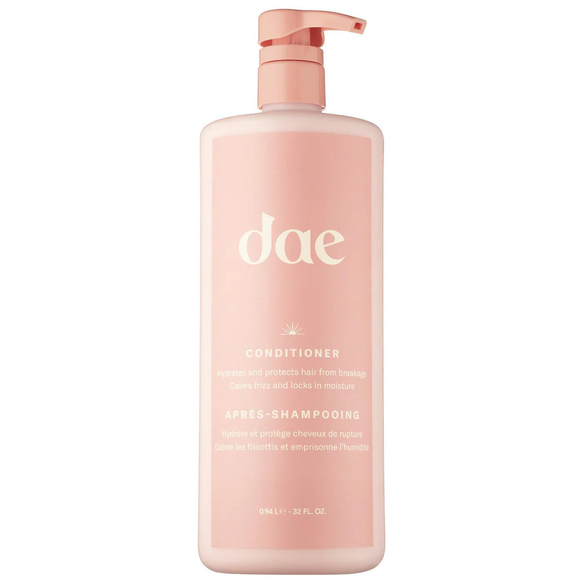 DAE Signature Conditioner bottle pouring for smooth hydration and frizz control.