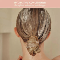 DAE Signature Conditioner detangle-hair shows smooth frizz control for easy styling.