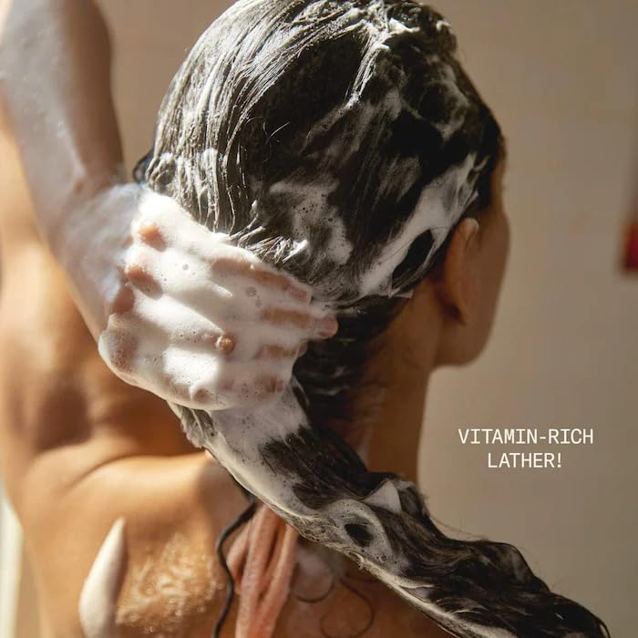 DAE Signature Shampoo hair-closeup reveals foamy lather nourishing a healthy scalp
