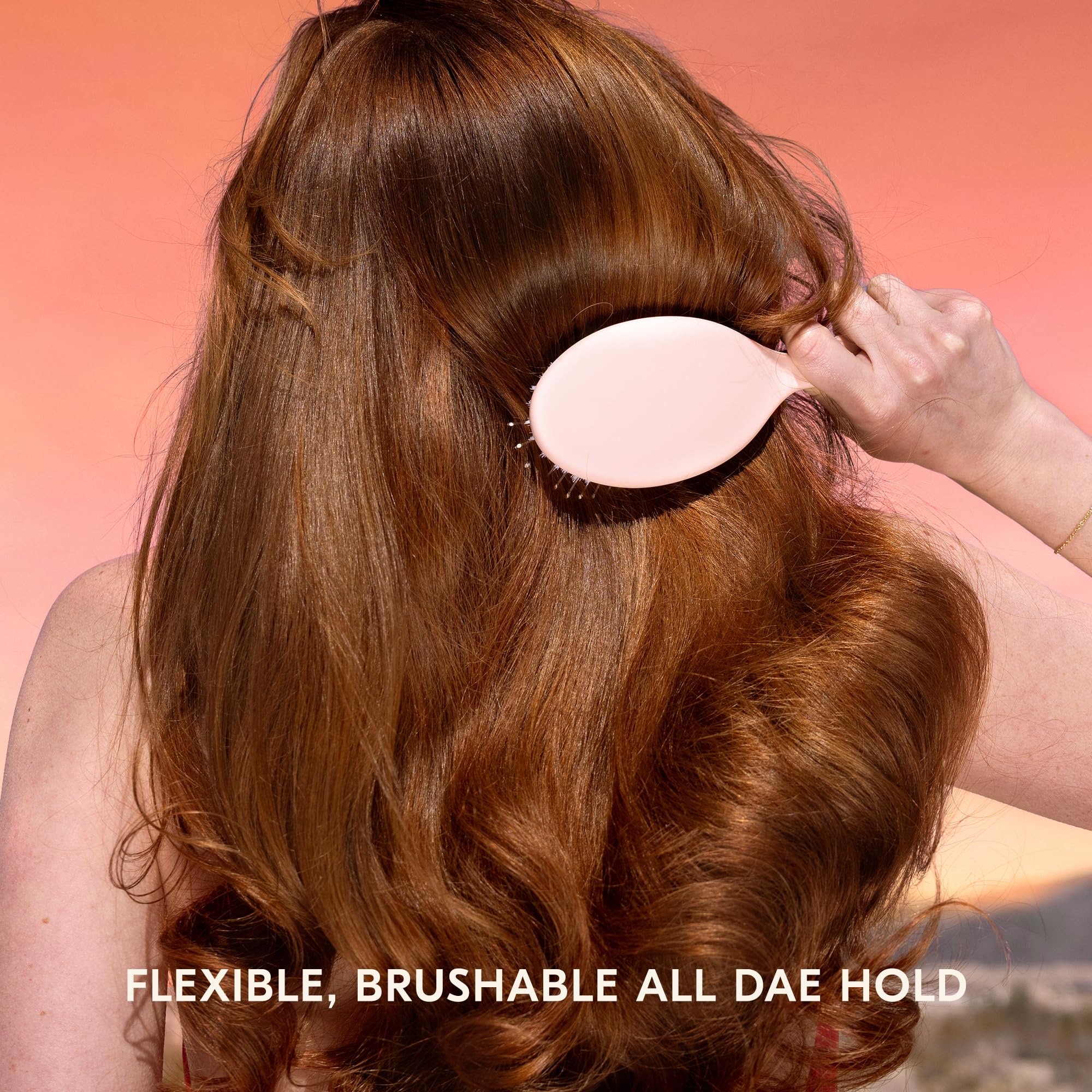 DAE Sunsetter desert botanical blend image highlights hydrating, frizz-taming formula.