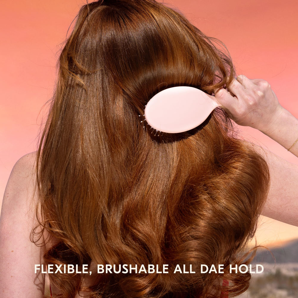 DAE Sunsetter desert botanical blend image highlights hydrating, frizz-taming formula.