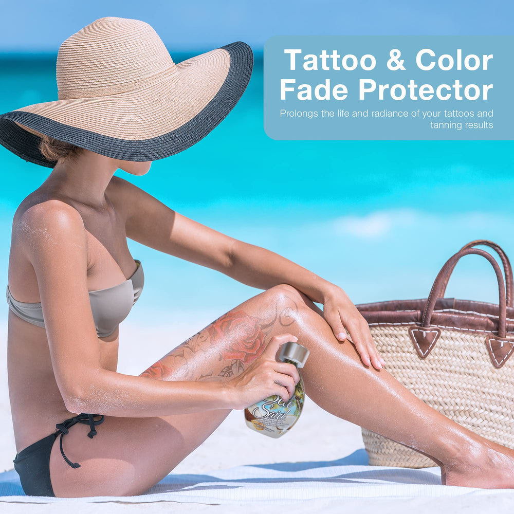 Dark Tans Exclusive That’s What Sea Said skincare-application shows tattoo-friendly tan with fade protection.
