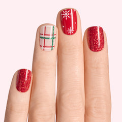 Dashing Diva Glaze Plaid About You nail strip applying on nail for easy at-home manicure.