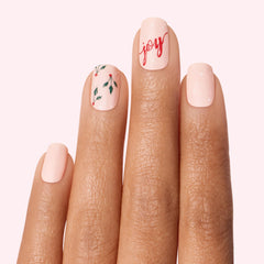 Dashing Diva Joy To The Girl holiday collection image shows festive matte nude peach with holly berries