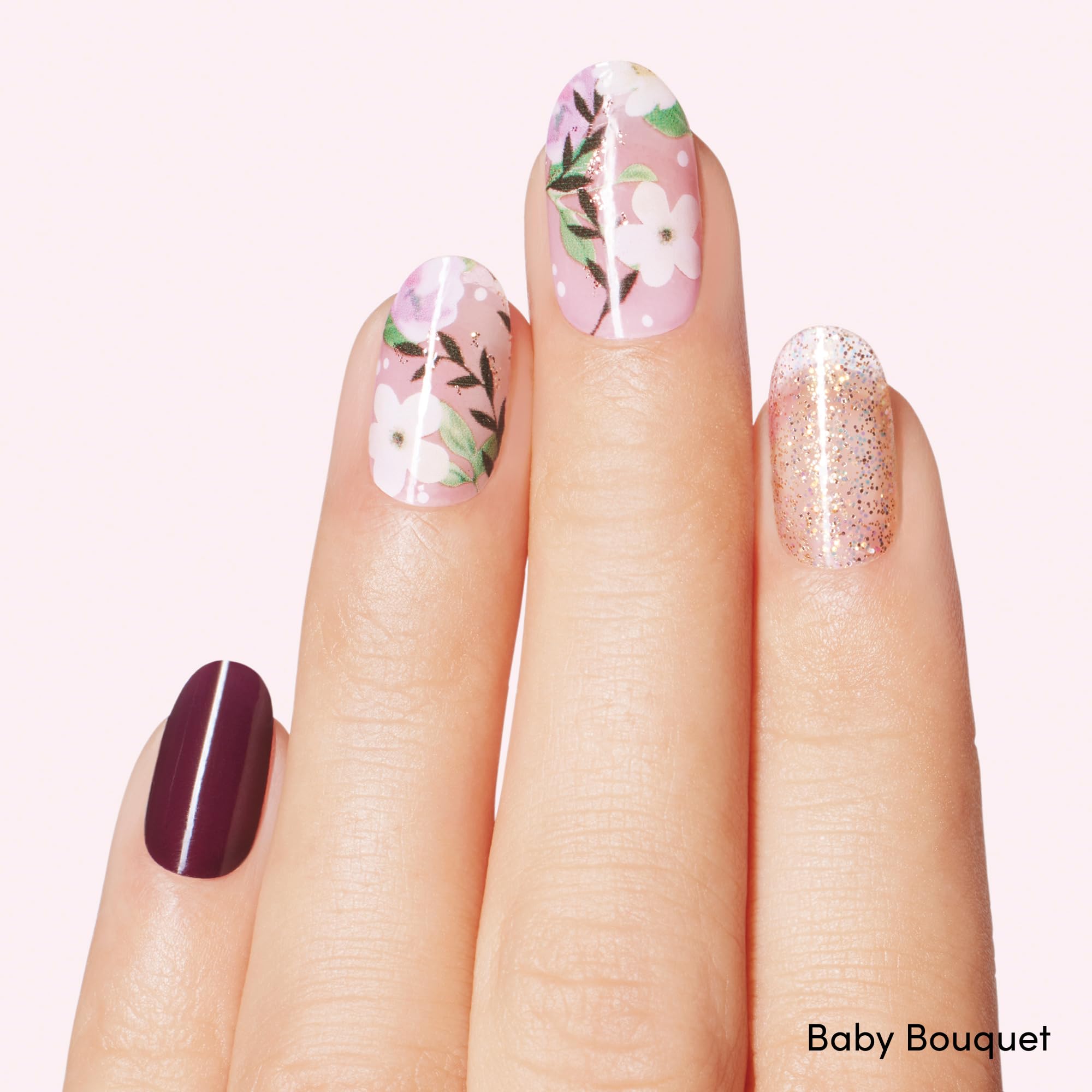 Dashing Diva Magnolia Vine gel strips on nails show chip-resistant finish.