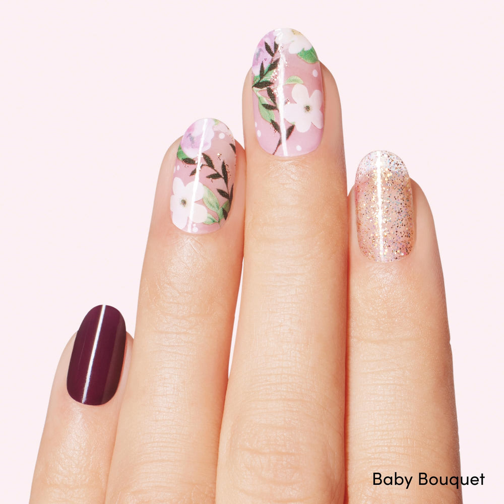 Dashing Diva Magnolia Vine gel strips on nails show chip-resistant finish.