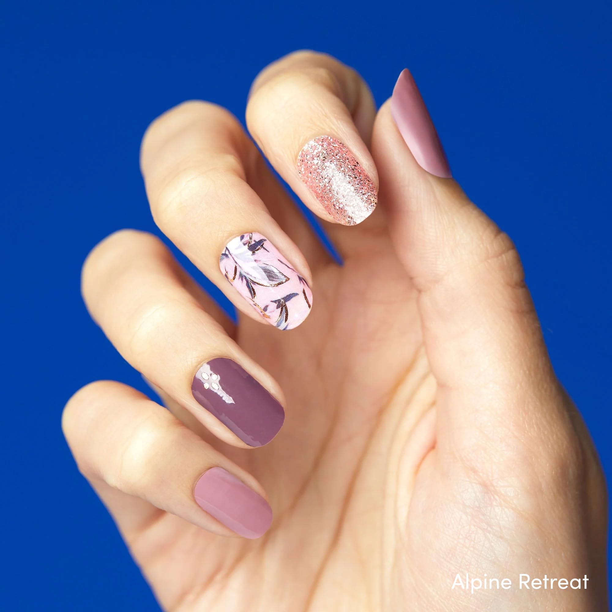 Dashing Diva Wildflower nails show a vibrant floral gel look for autumn wear