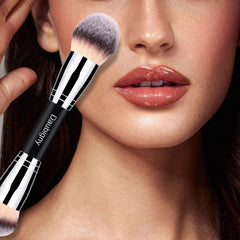 Daubigny dual-ended powder brush application highlighting seamless powder buffing.