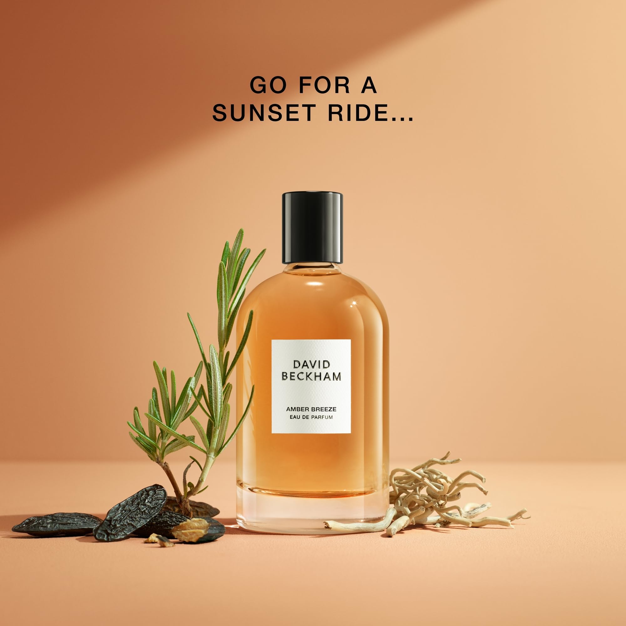 David Beckham Amber Breeze atomizer mist image emphasizes even spray and easy application.