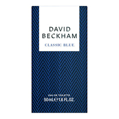 David Beckham Classic Blue metallic cap close-up against sky-blue juice.