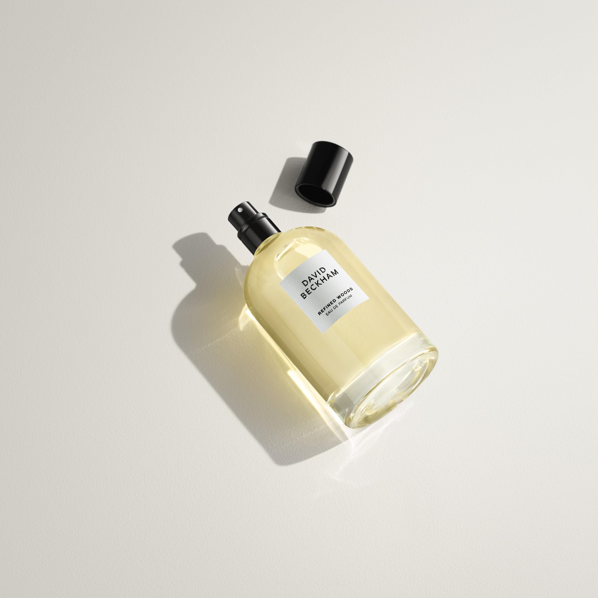 David Beckham Refined Woods cedarwood base close-up emphasizes warm, lasting woody impression.